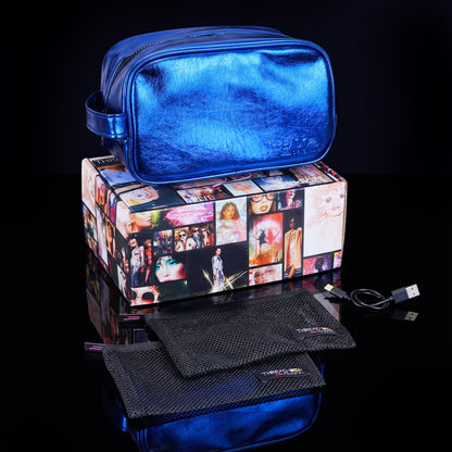 Ocean blue metallic LED travel makeup bag with USB charging cable and removeable mesh pouches on collectible Studio 77 gift box. Large vegan leather cosmetic organizer with rechargeable lighting and wipeable insulated lining by Thread Original. 