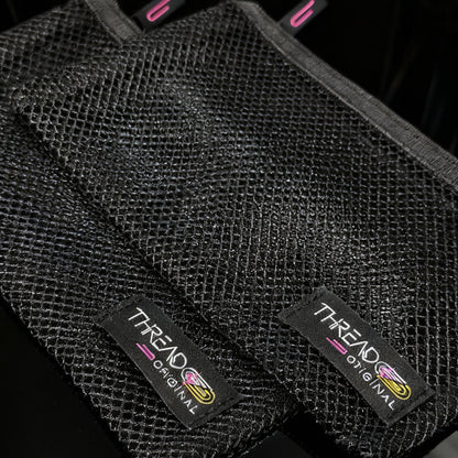 Two removeable mesh organizer pouches included with the Thread Original Aurora LED travel makeup organizer.