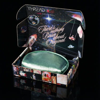 Luna Mint LED makeup bag displayed inside Thread Original collector gift box.