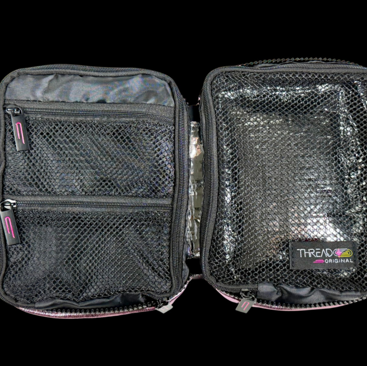Multi-compartment makeup organizer with mesh zip pockets and wipeable insulated interior by Thread Original.