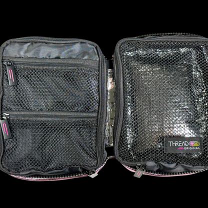 Multi-compartment makeup organizer with mesh zip pockets and wipeable insulated interior by Thread Original.